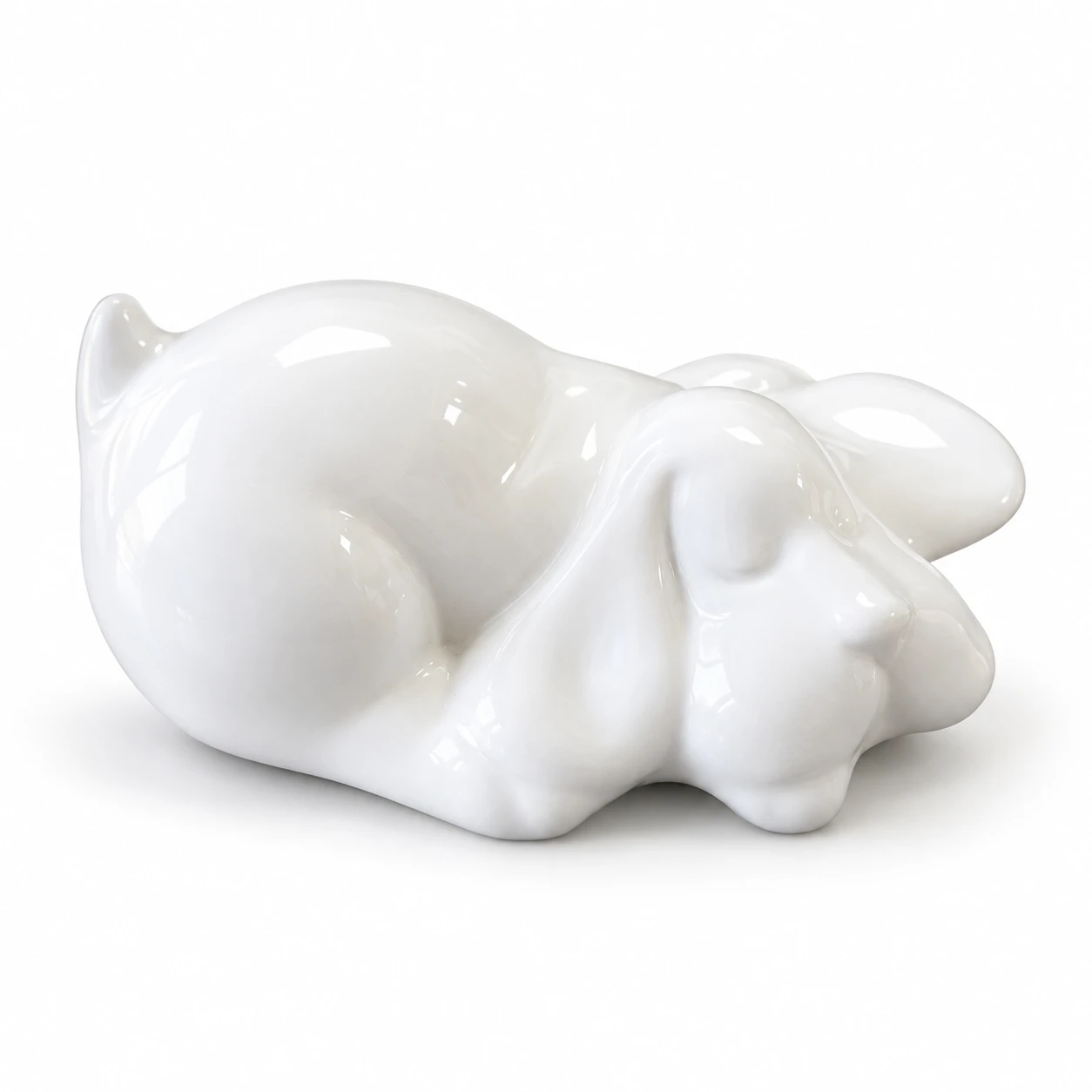 Urna in ceramica bianca a forma di cagnolino che dorme